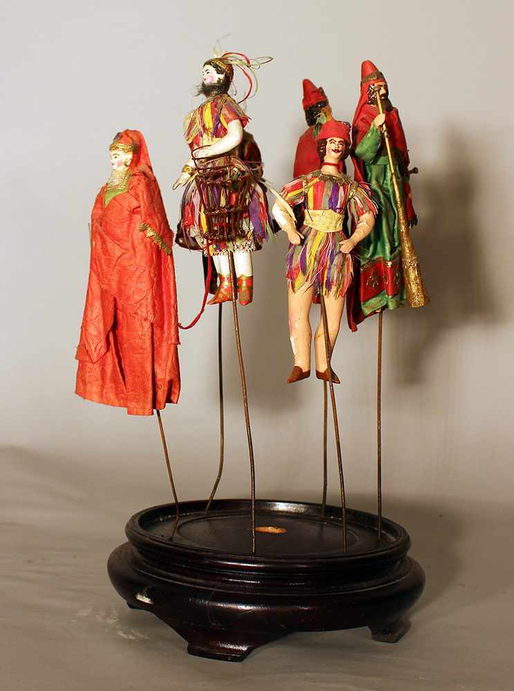 Six play figures from the Magic Flute from a puppet theatre; wood carved with textile clothes,