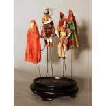 Six play figures from the Magic Flute from a puppet theatre; wood carved with textile clothes,