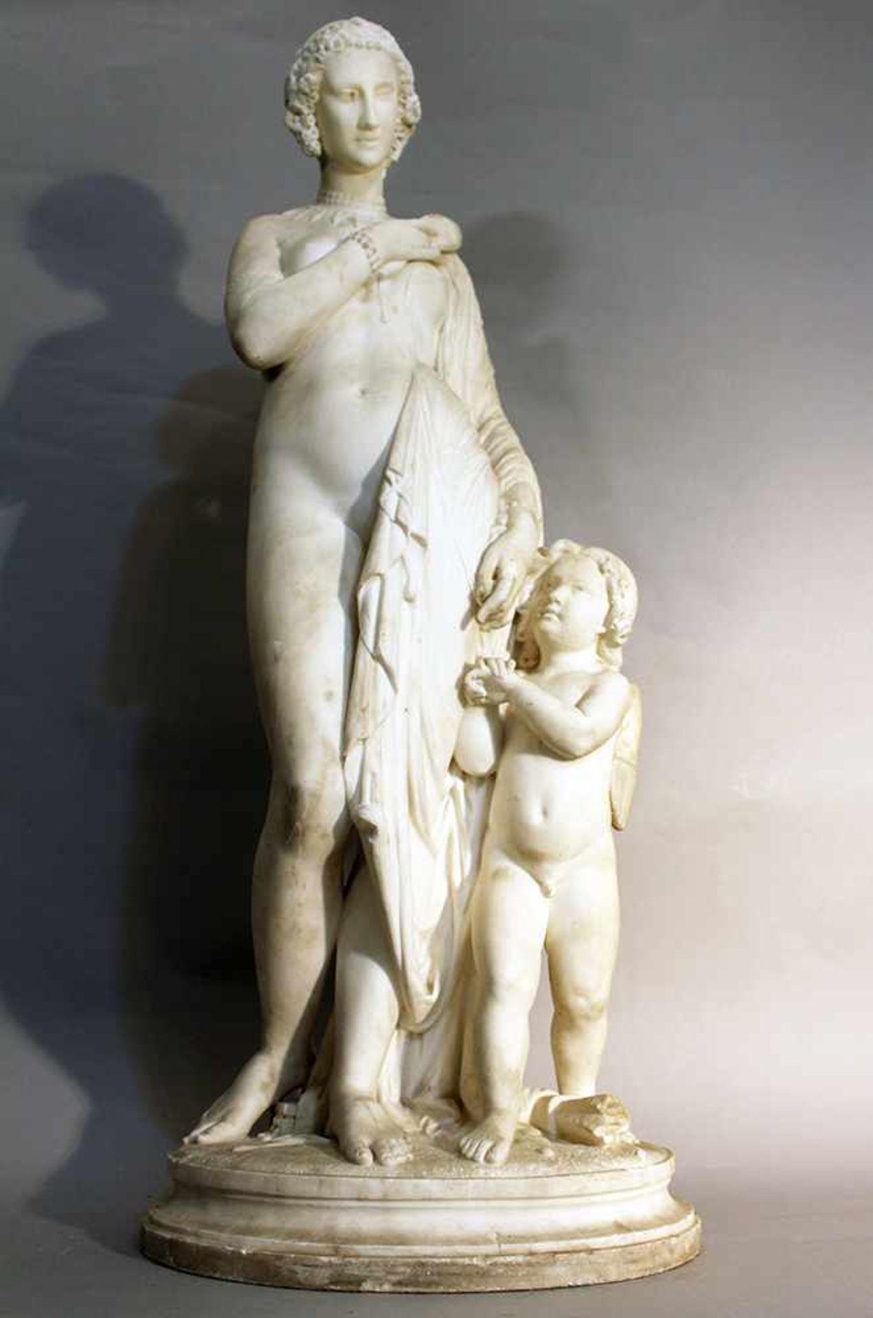 Giovanni Maria Benzoni (1809-1873), Marble sculpture of Amor and Psyche; she with toga, mirror and