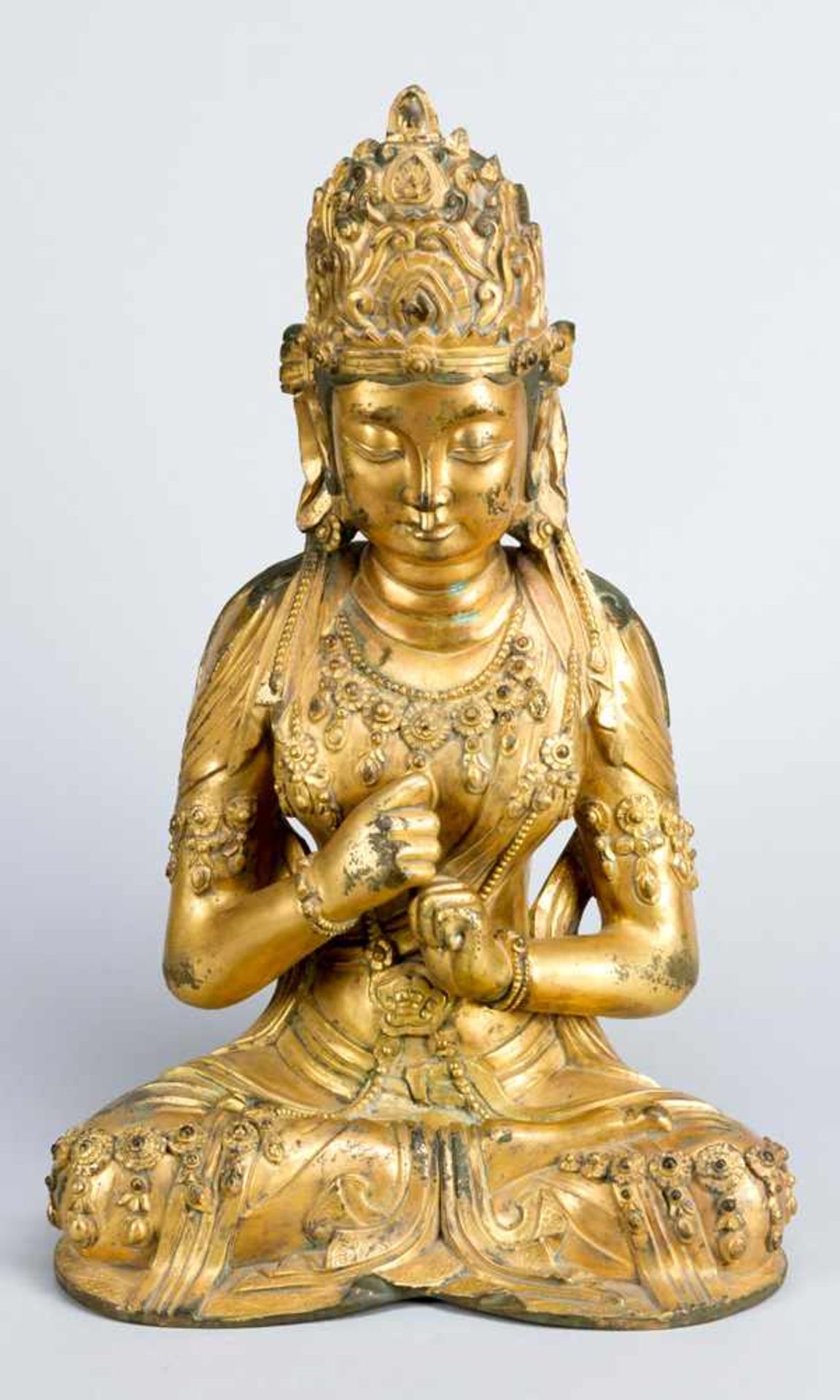 A late Ming bronze sculpture of goddess Guanyin; bronze cast with very fine and deep hand finish,