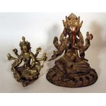 Two Indochinese bronze scupltures of godesses, on integrated bases; cast with original patina; one