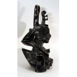 Cubistic bronze sculpture of a violinist; bronze cast with original patina; monogrammed on the