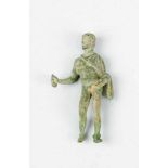 Bronze sculpture in ancient manner, showing a naked god with toga and a bag in his hand. Full cast