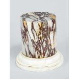 Marble collumn , cylindrical shape with red white,grey and brown mottled body ,polished on white