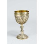 Augsburg silver beaker on round central feed and collumn, the cup with rich chased and engraved