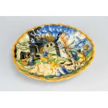 Urbino Ceramic Bowl with waved upstanding border and moulded and bowled center. Multicolored painted