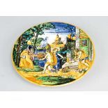 Urbino ceramic plate with bright round border and moulded center with multi colored paint of an