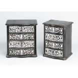 Pair of Ebony and I. miniature commodes in baroque manner , each with four waved drawers with rich