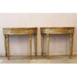 Pair of Demi Lune Consoles, in neoclassical style, each with four fluted concarve feet and rich