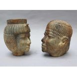 Two Stone Heads in ancient Egyptian taste, showing a male and female Emperor, partly remains of