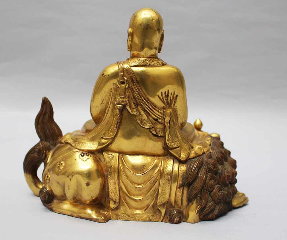 Chinese gilted bronze sculpture of Buddha in sitting position with falted mantle and his hands - Image 2 of 3