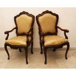 Pair of Venetian Armchairs, on four curved legs, with carved lower border with volutes and