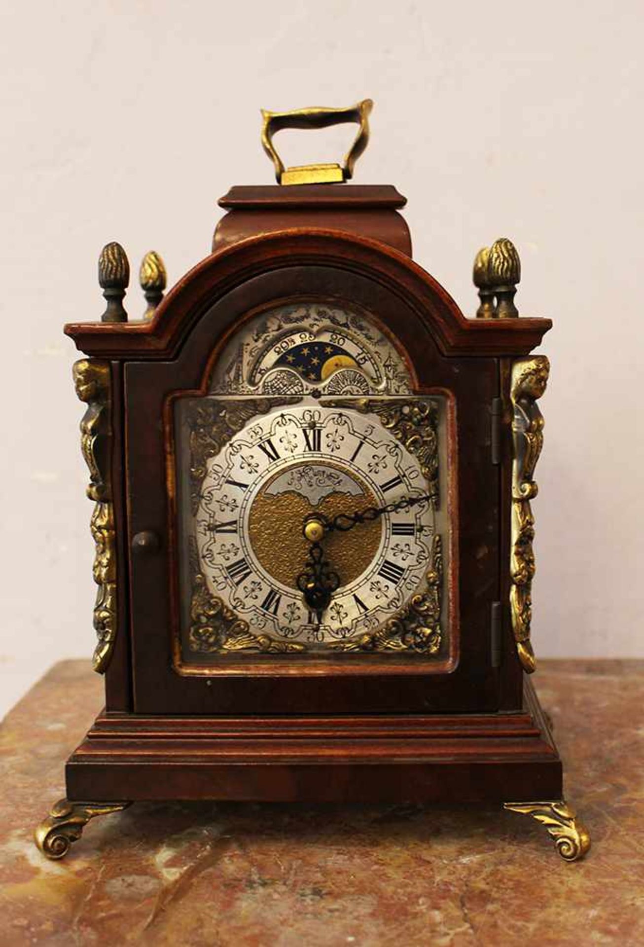 English Clock, silvered metal dial, iron fingers, and moon display, partly engraved with four bronze