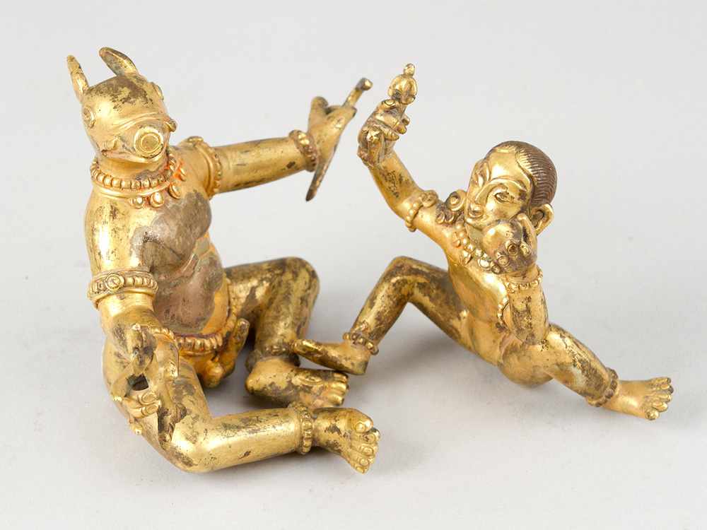 Indian erotic bronce sculpture, of a female and male godness with several objects in hands and the - Image 3 of 3