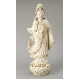 Blanc de Chine, porcelain sculpture of Guanyin in standing position on Lotus base, glazed. Height: