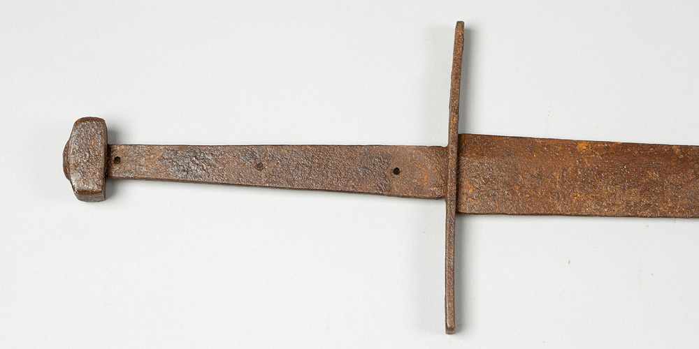 Large Medieval Iron Sword, with canted blade, handprotection and grip, ending in rectangular knop, - Image 2 of 3