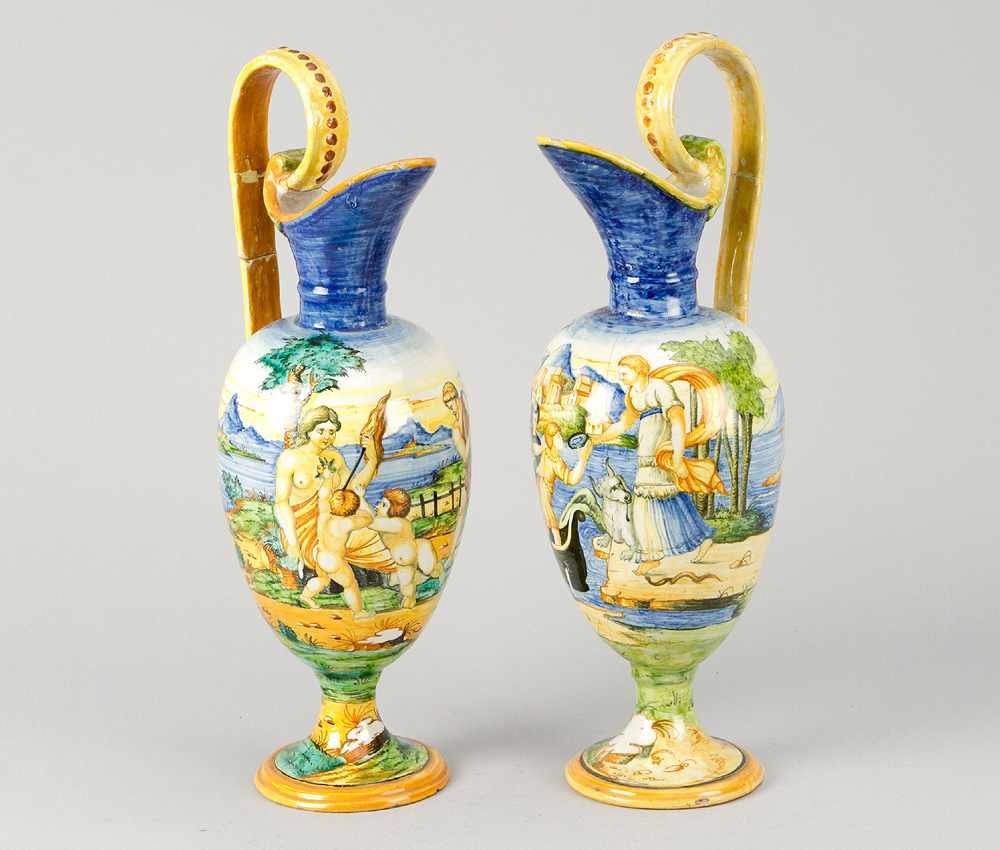 Pair of Urbino Jugs, Ceramic in classical shape with two scrolled handgrips and spout. Painted