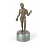 A Roman Bronze Statue, of a standing male nude, full bronze cast with original patina, on later