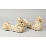 Pair of Terracotta Horses, torsos, remains of black and white paint, holes in nose, mouth and on