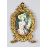 Miniaturist 19th Century, portrait of a young lady with yellow cap in landscape, signed „L.