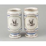 Pair of Apothecary Albarellos, ceramic in round shape with garlands and floral painted