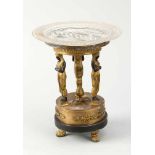 Empire Centrepiece, bronze cast with three sculptures in egyptian style on round base with upper