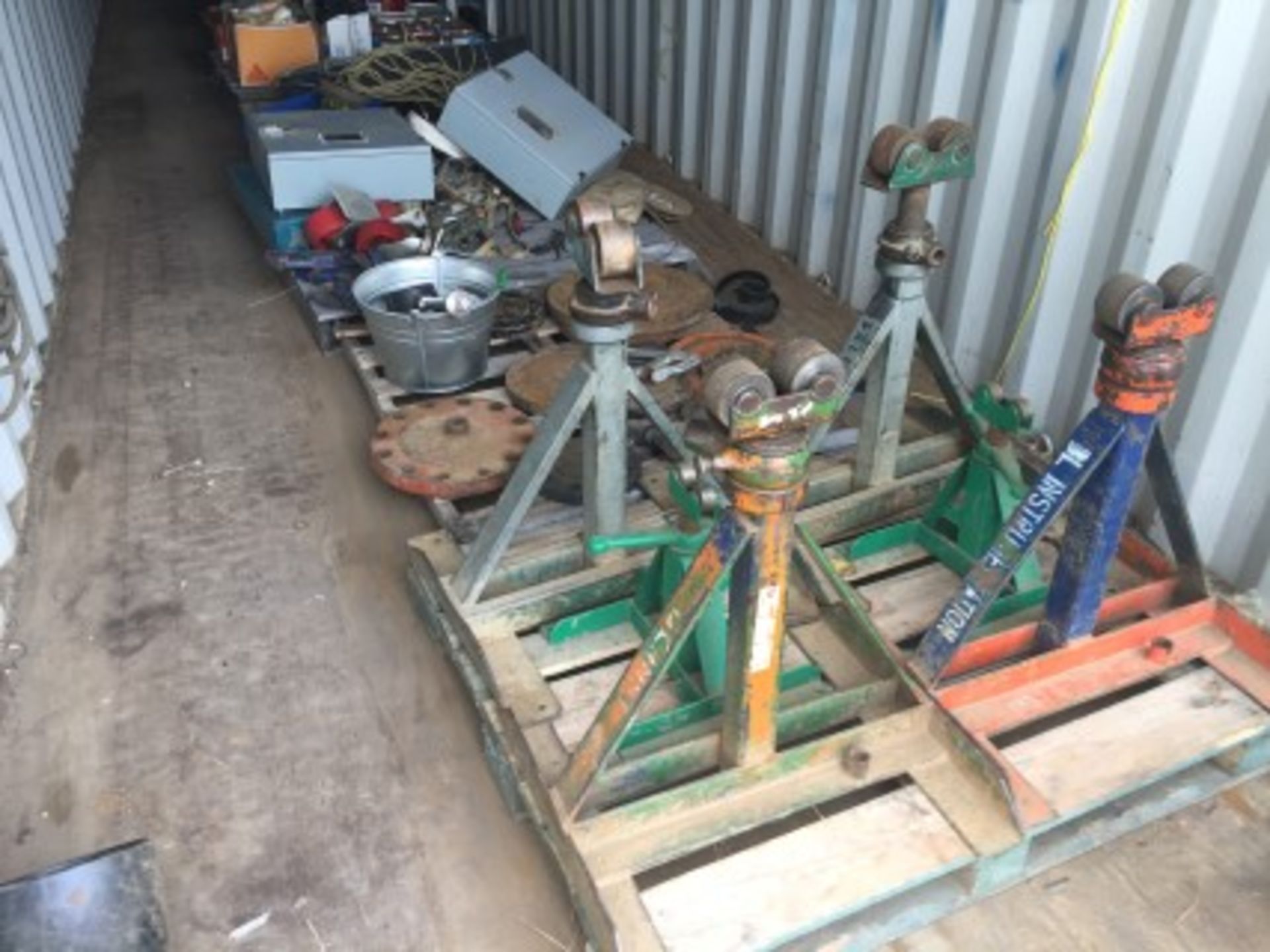 All Contents of container Lot # 322 including misc. pipe stands, flanges, guages, elec. supplies,