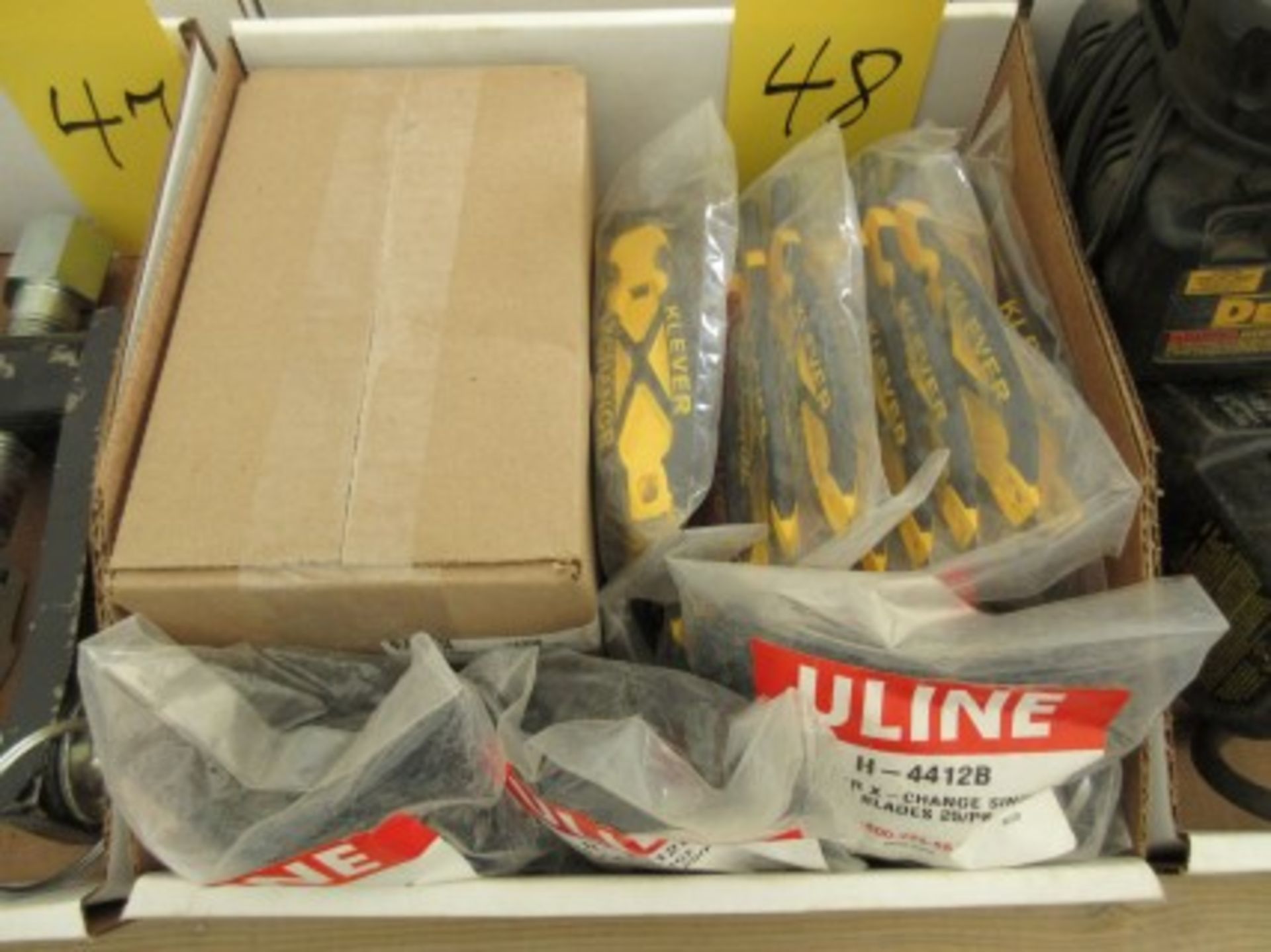 5 packages plus 1 case of Cleaver single use safety knives