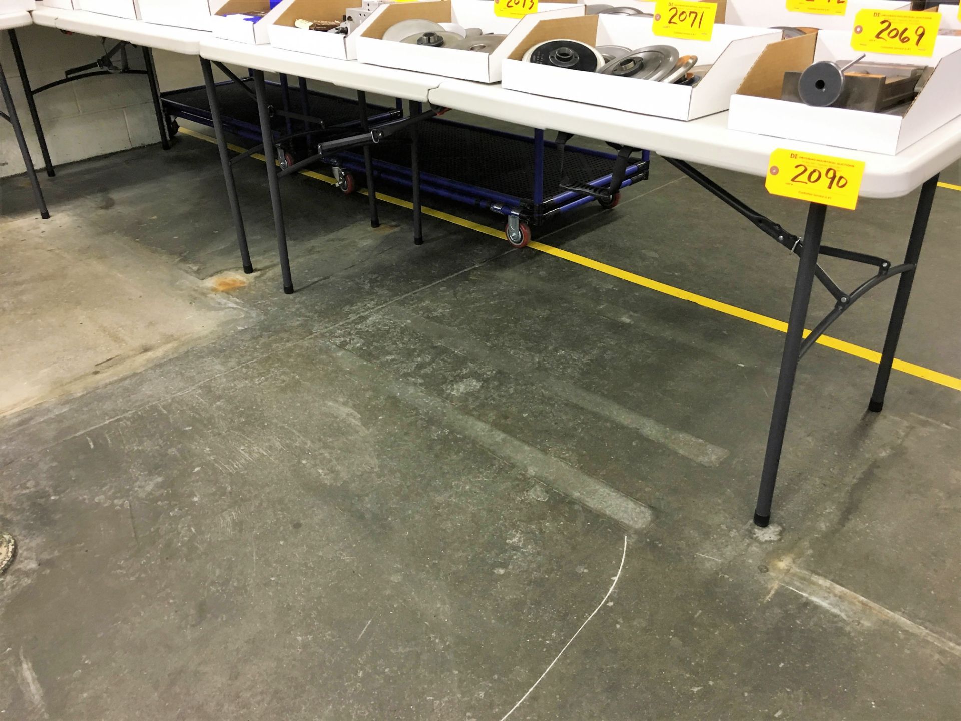 (3) (NEW) FOLDING TABLES (DELAYED DELIVERY)