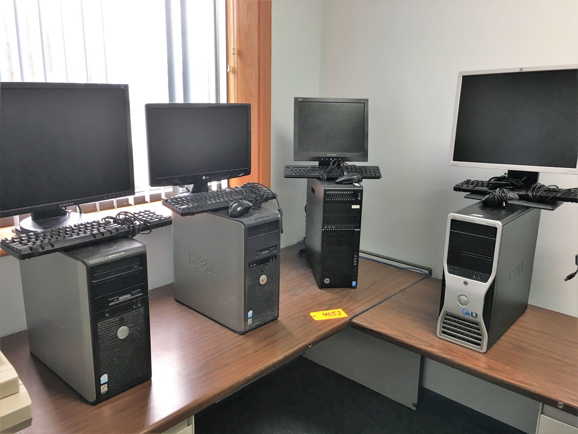 (4) DESK TOP COMPUTERS WITH FLAT SCREEN MONITORS