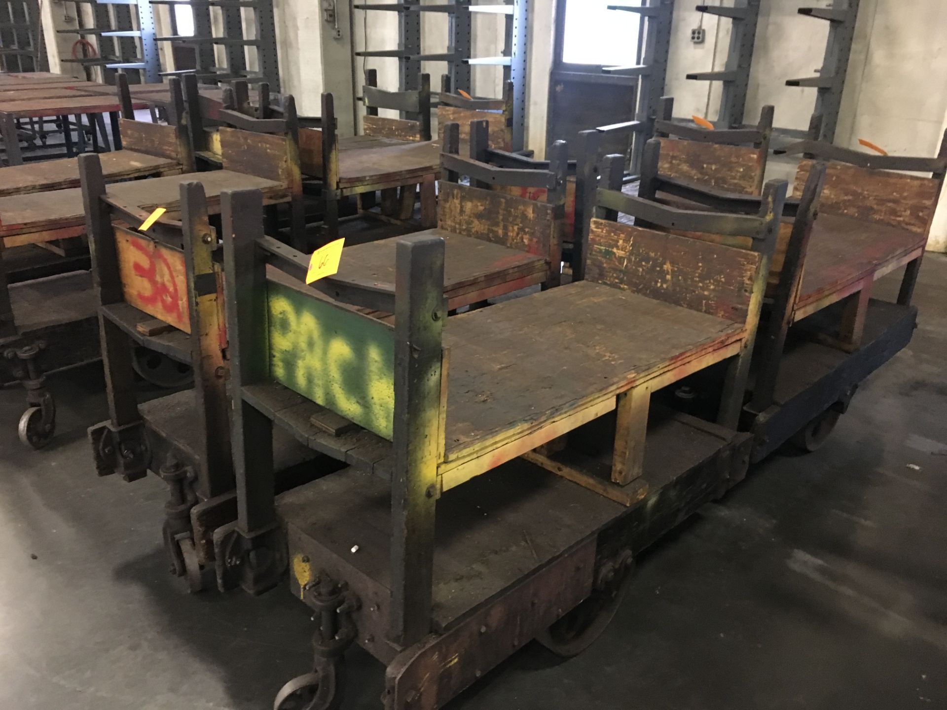 (4) Antique Wooden Carts with Cast Iron Wheels