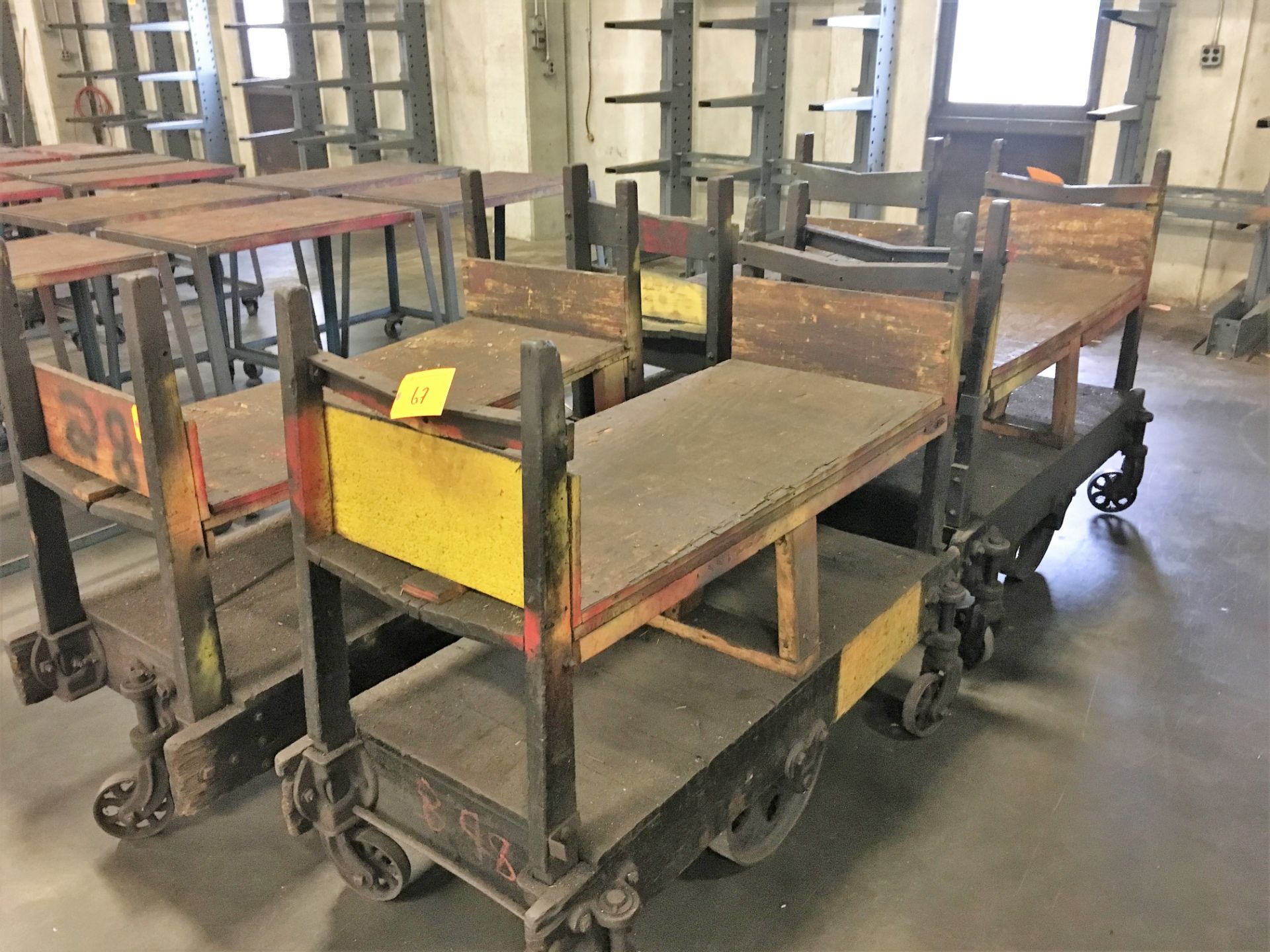 (4) Antique Wooden Carts with Cast Iron Wheels