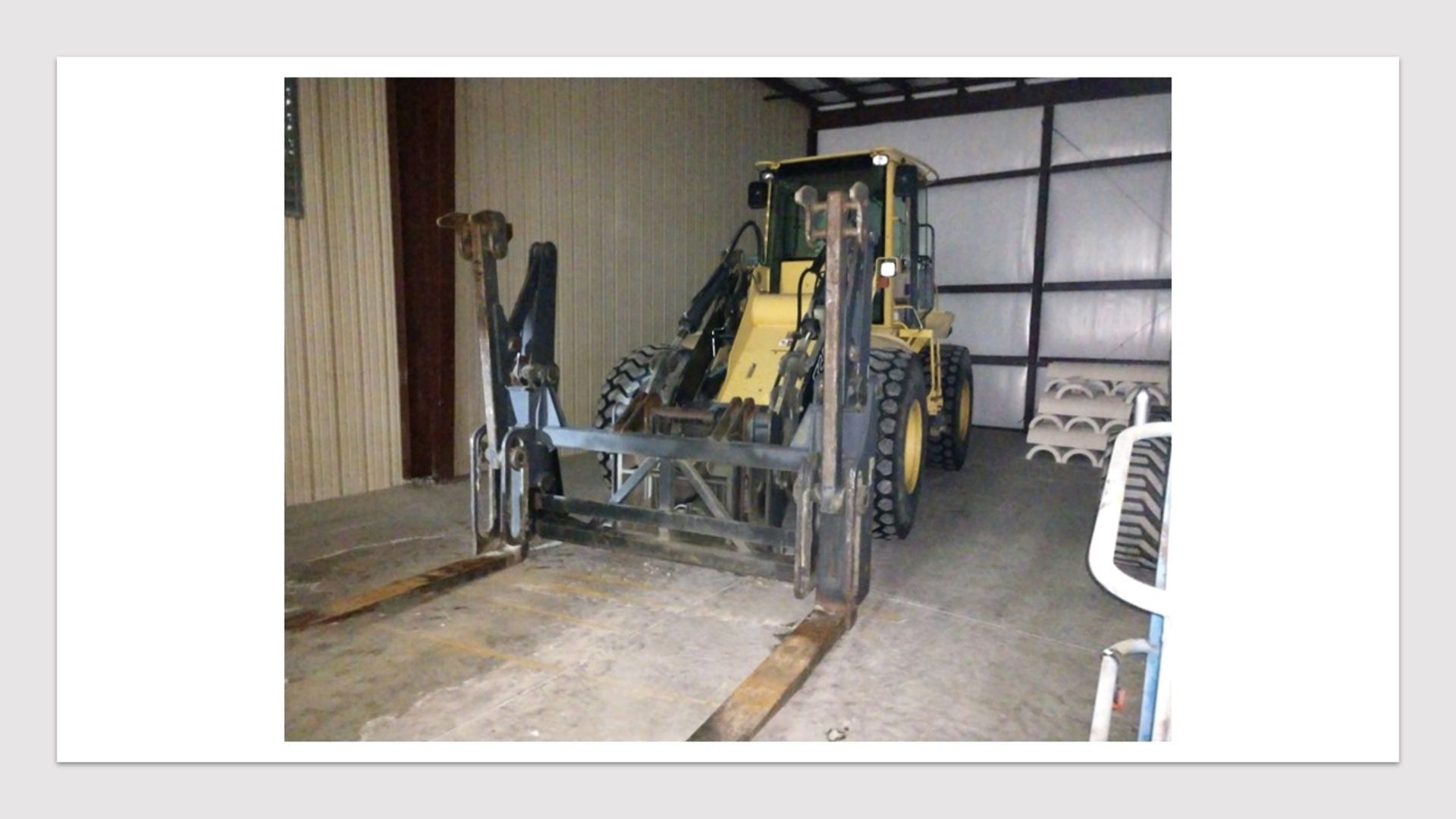 John Deere Model TC54H Front End Loader with Hydraulic Pipe Grapple Fork Attachment, 72" Between