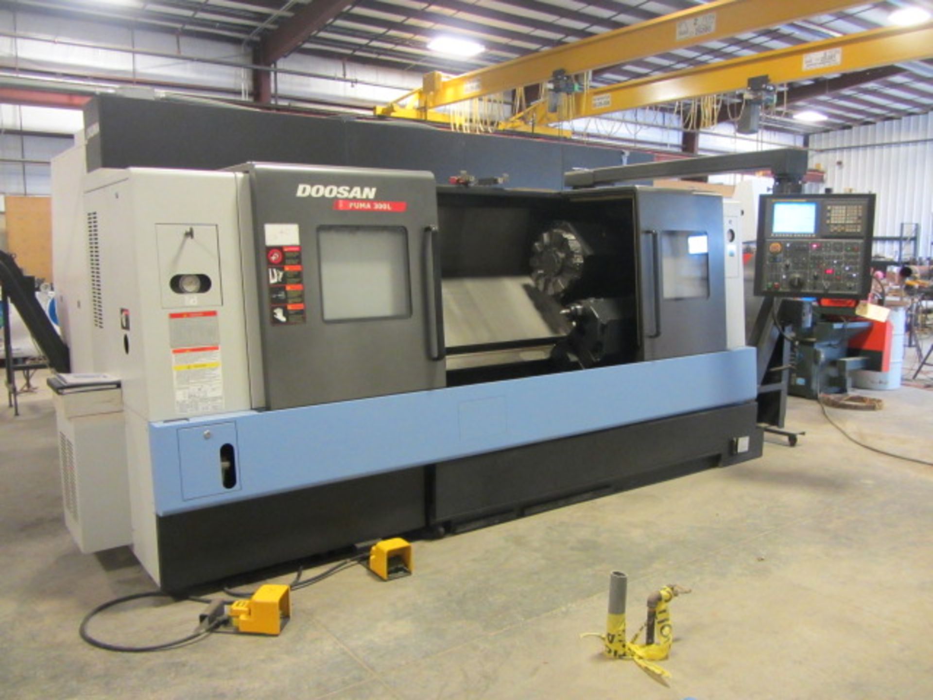 Doosan Puma Model 300LC CNC Turning Center with 12'' 3-Jaw Power Chuck, Approx 55'' Max Distance