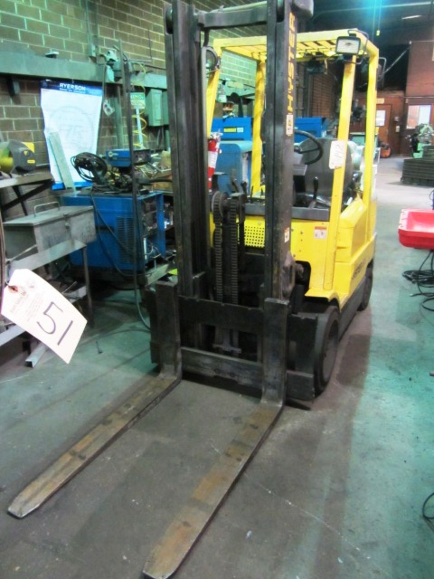 Hyster Model S65XM-Turbo 5,000lb Propane Forklift with Cage, Solid Tires, 48'' Fork Length,