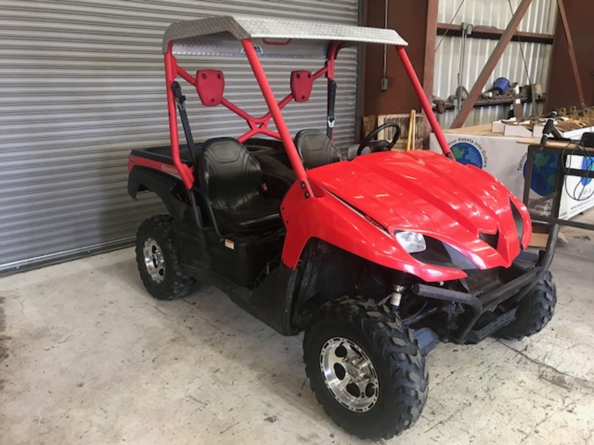 Kawasaki Teryx 750CC 4x4 with (5) Pneumatic Tires, Chrome Rims, Diamond Plate Roof, Radio, Digital