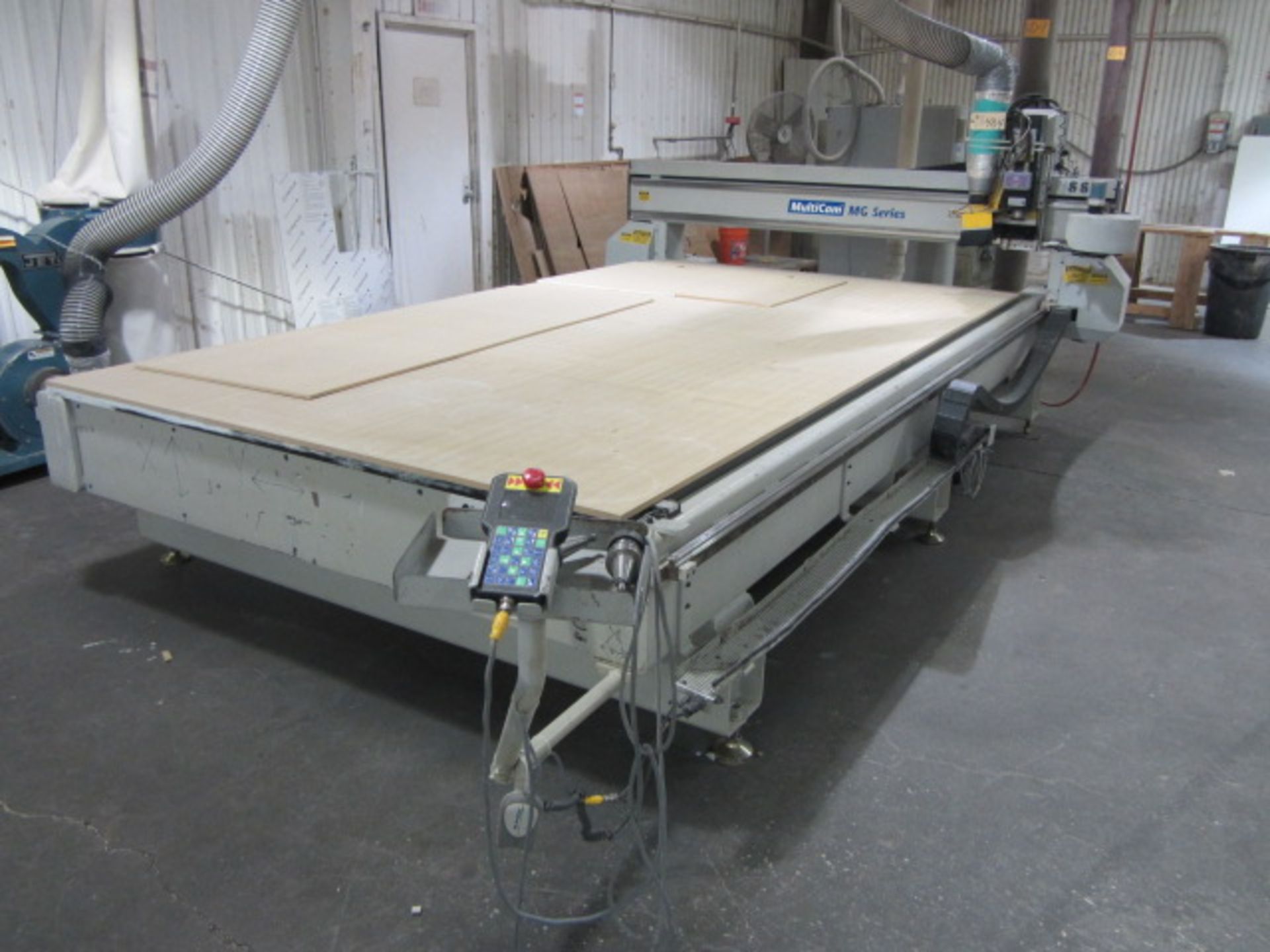 Multicam MG Series CNC Router with 8 Station Automatic Tool Changer, 6-1/2' x 12' Vacuum