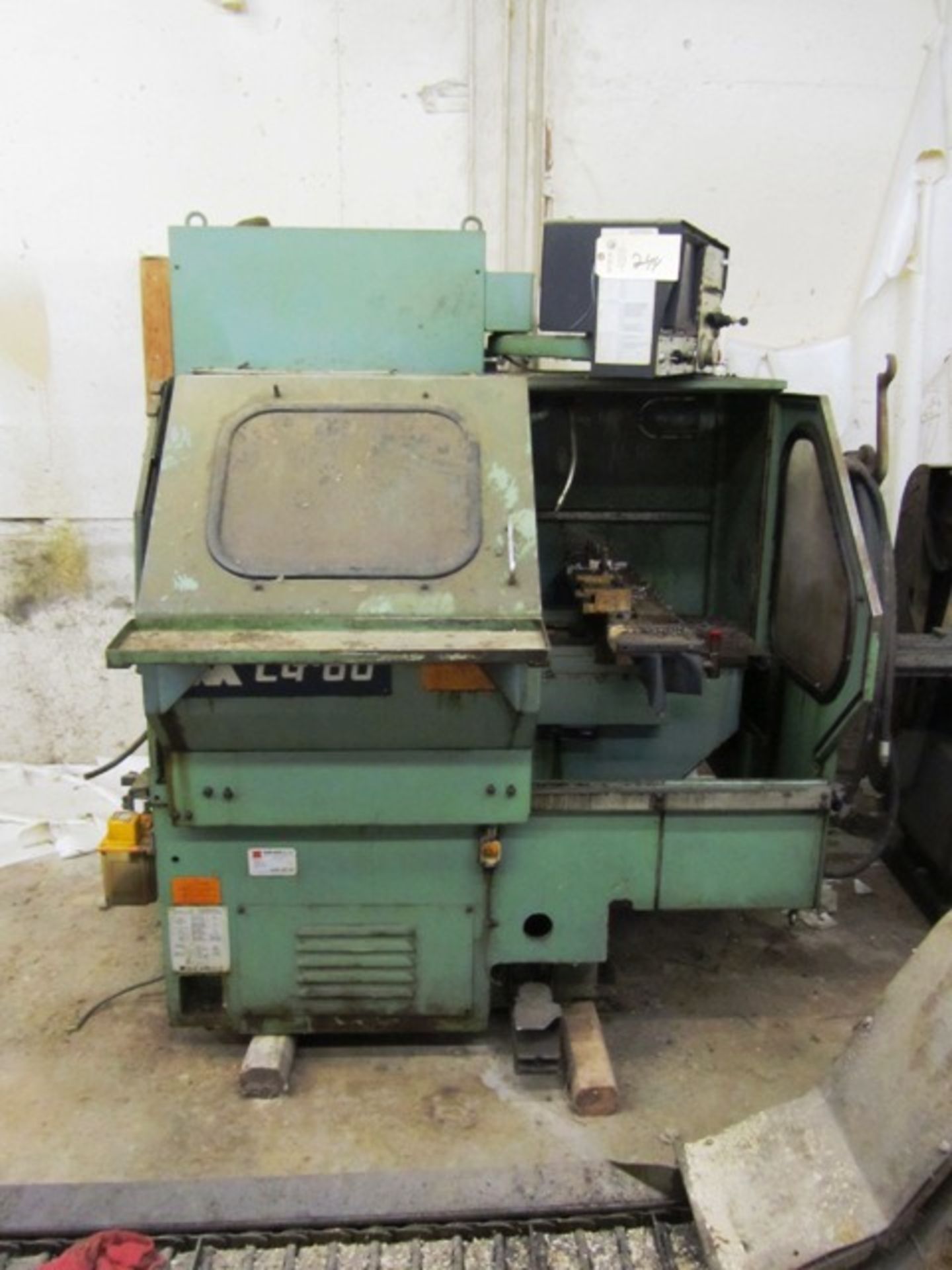 Wasino Model LG60 Gang Type CNC Lathe & Conveyor