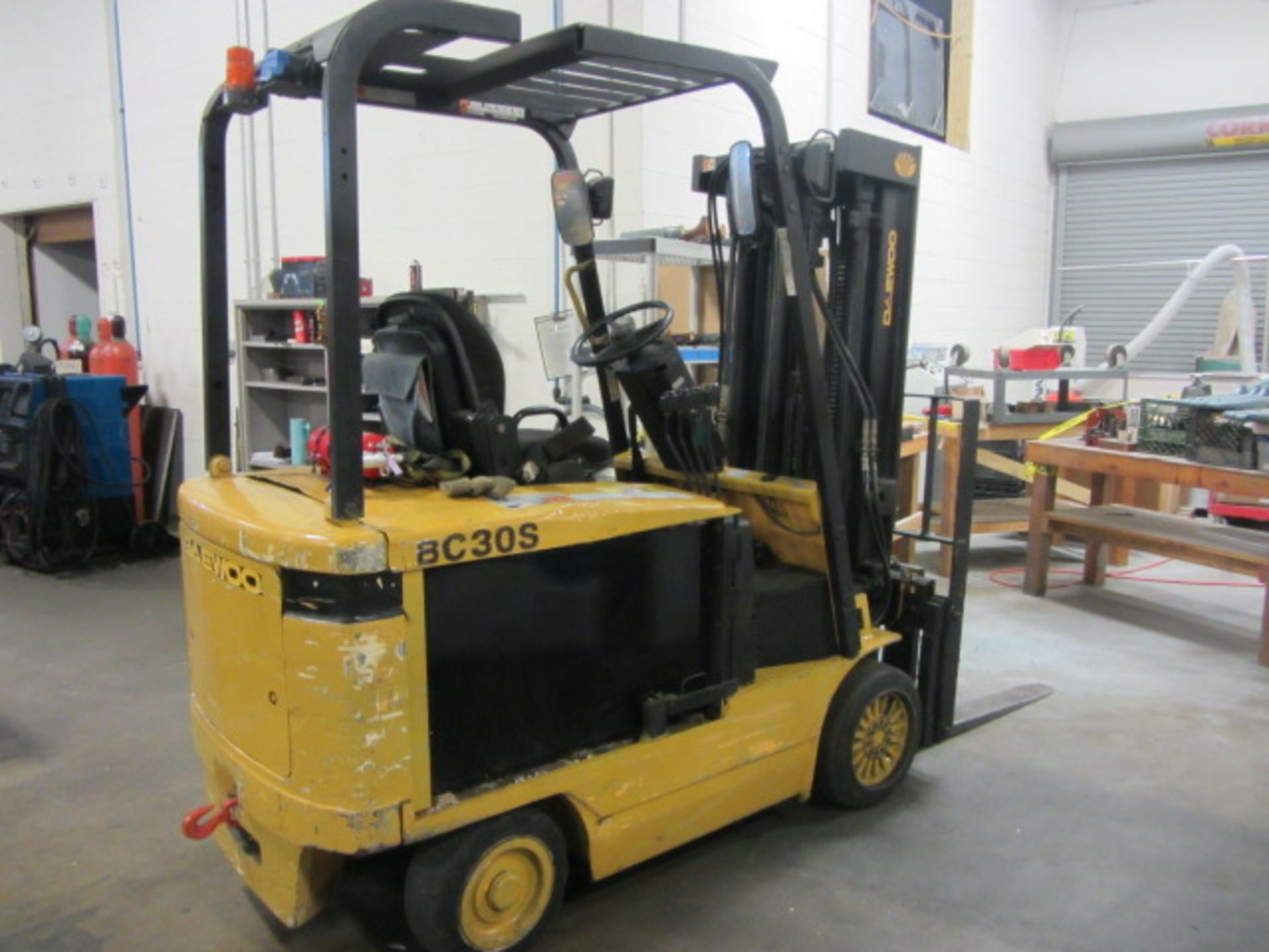 Daewoo Model BC-30S-2 6000lb Capacity Electric Forklift with 3-Stage Mast, 42'' Forks, Automatic