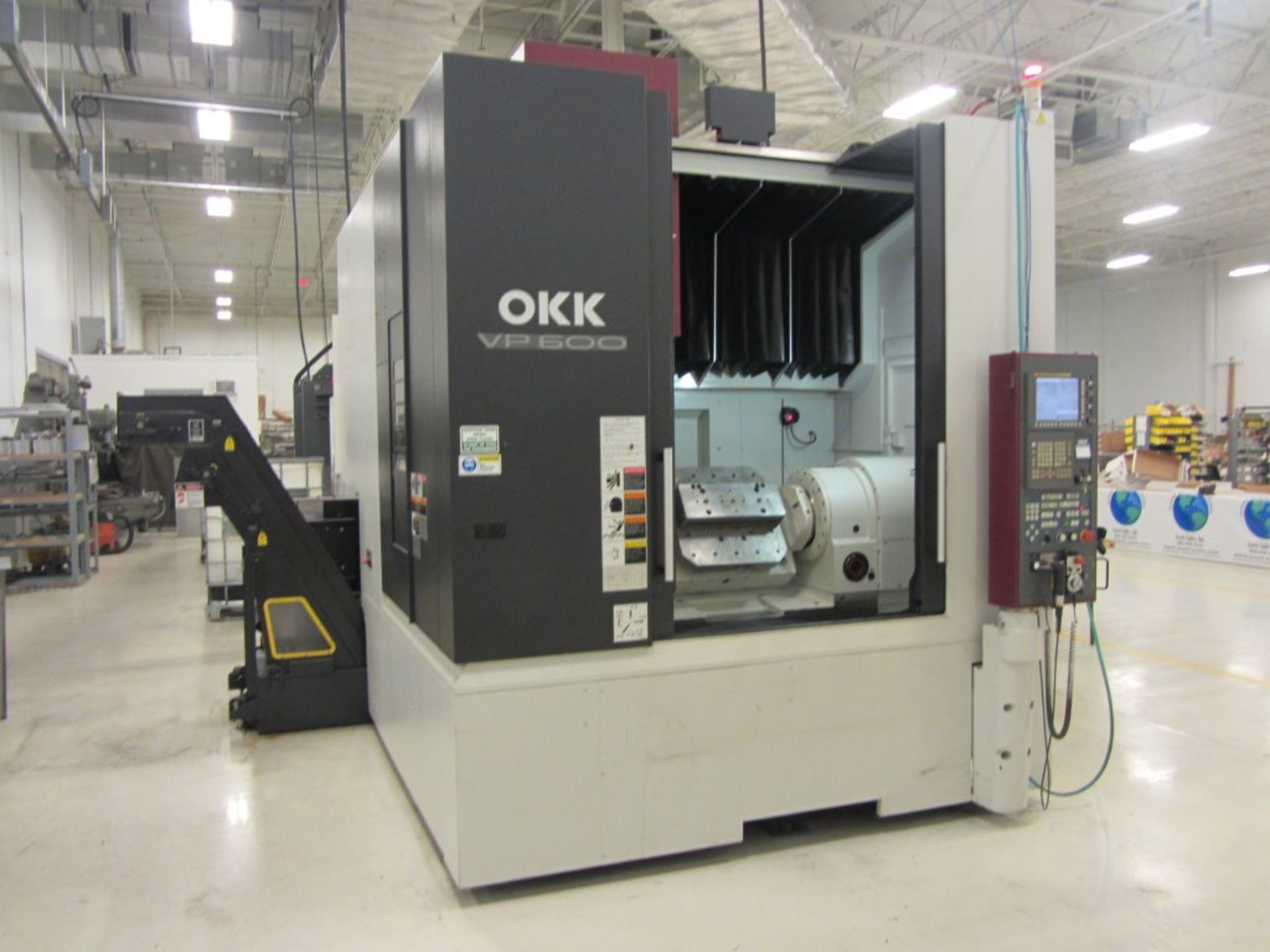 OKK VP-600 5-Axis CNC Vertical Machining Center with 19.7'' Diameter 4/5 Axis Rotary Trunnion Table,