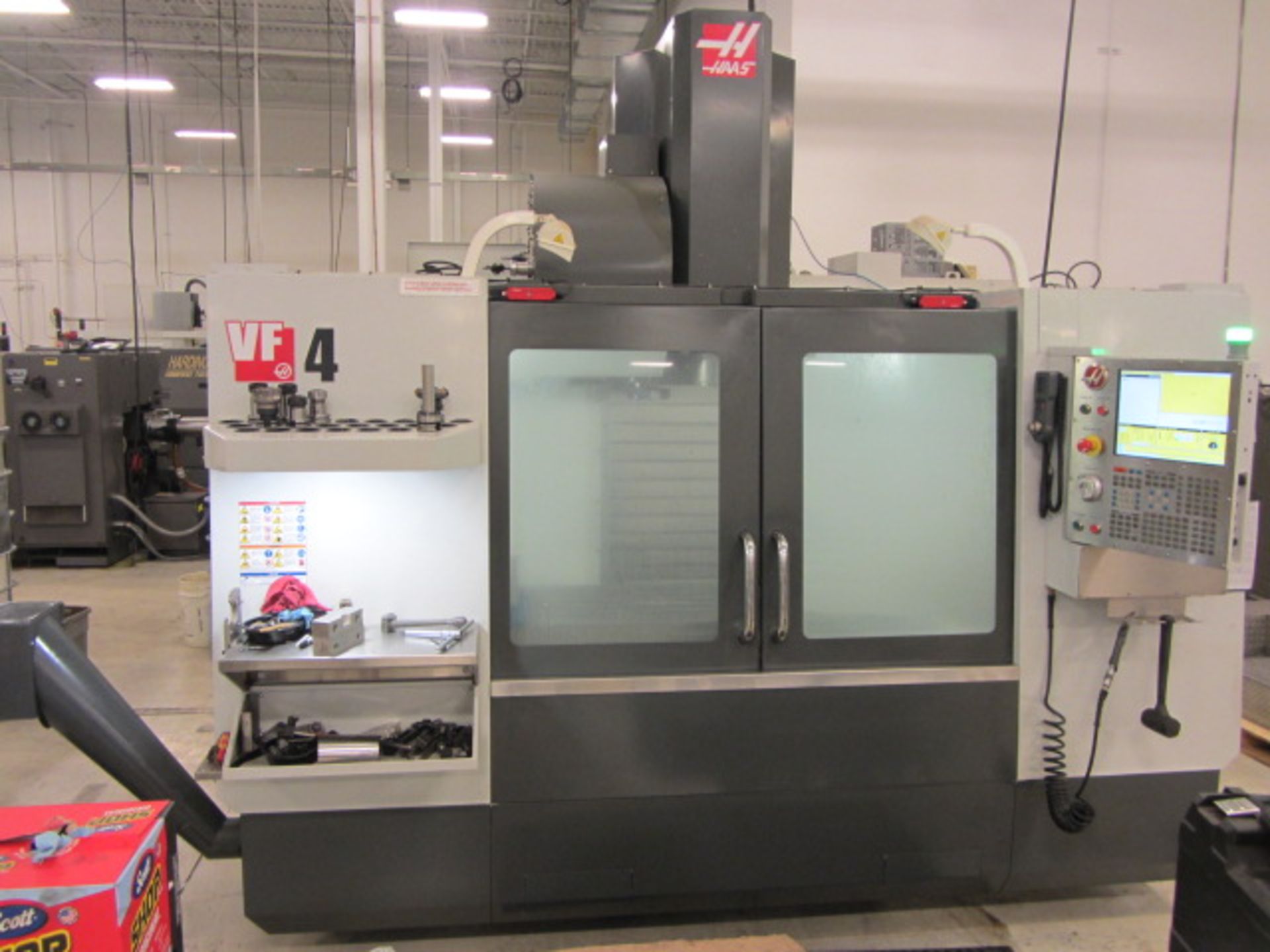Haas VF-4 CNC Vertical Machining Center with 52'' x 18'' Table, #40 Taper Spindle Speeds to 8100