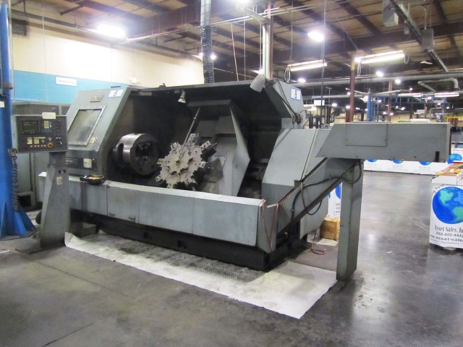 Jones & Lamson Model 4521 CNC Chucker with 24'' Erickson Indexing Chuck, 8 Position Turret, GE Fanuc