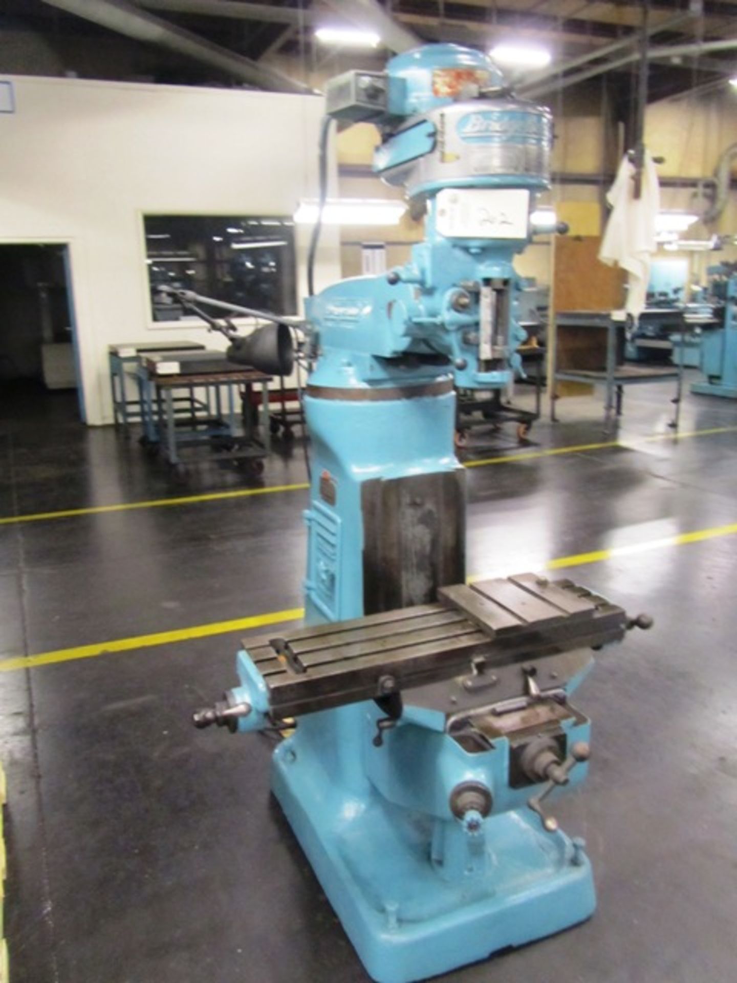 Bridgeport Vertical Milling Machine with 9'' x 32'' T-Slotted Table, R8 Taper, Spindle Speeds to
