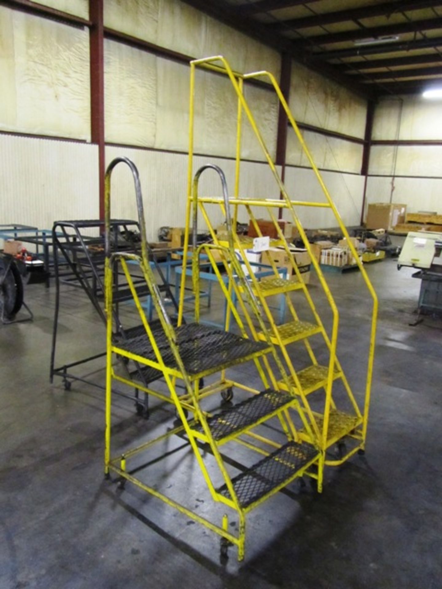(2) Portable Stock Ladders