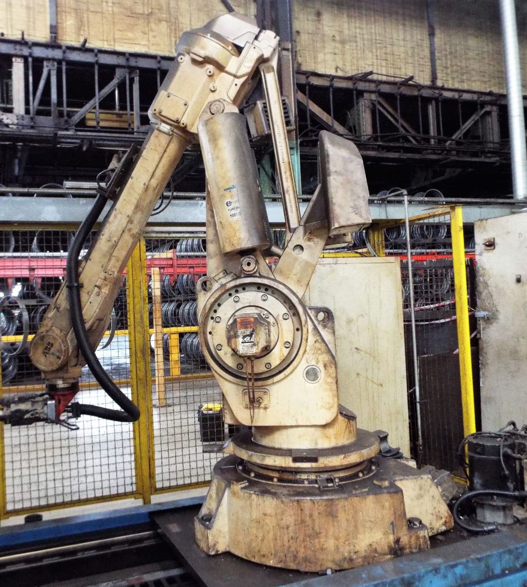 ABB-IRB-6400 6 Axis Robot Atttached To 7th Axis Powered Conveyor.