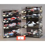 Minichamps. Eight 1:43 scale F1 diecast model cars : two McLaren Mercedes MP4-21 P.