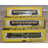 OO gauge. Trix 1188 4-6-2 LNER green 'A. H. Peppercorn', together with two coaches. G in F boxes.