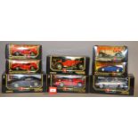 Eight Bburago 1:18 and 1:24 scale diecast models. Boxed, VG.