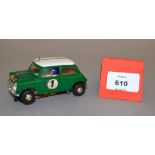 Scalextric C7 Rally Mini Cooper in green with white roof, racing number 1.