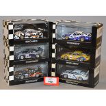 Minichamps. Six Porsche 911 GT3 RS diecast model cars in 1:43 scale.